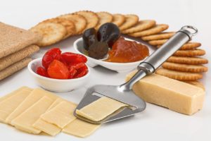 cheese slicer, crackers, appetizers